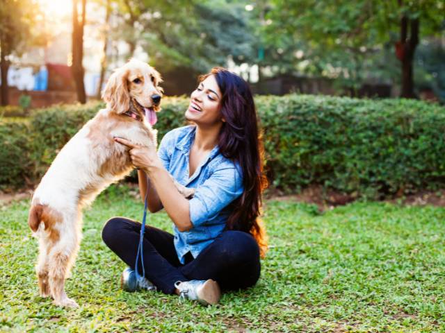 Indian female owner with her dog